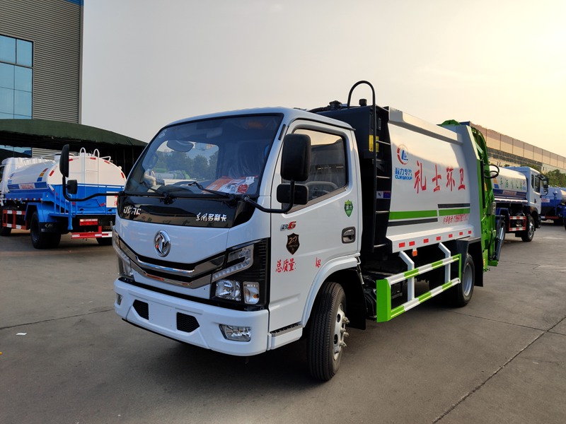广东河源石总订购多利卡国六压缩式垃圾车(图1)